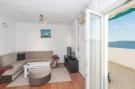 Vakantiehuis Apartment Stipic Omis - Three Bedroom Apartment wi