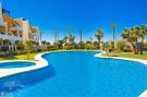 Holiday homeSpain - Costa Tropical/de Almeria: Bajo con terraza y acceso directo a piscina comuni