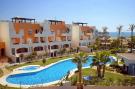 FerienhausSpanien - Costa Tropical/de Almeria: Bajo con terraza y acceso directo a piscina comuni