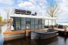 VakantiehuisNederland - : Houseboat 'de Valreep' met tuin - Paviljoenwei 2