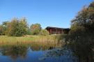 FerienhausNiederlande - : Lake view villa met zwem- vissteiger