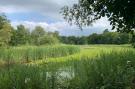 FerienhausNiederlande - : Lake view villa met zwem- vissteiger