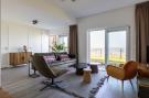 VakantiehuisNederland - : Luxe appartement Vista Maris 'Laguna Beach House' 